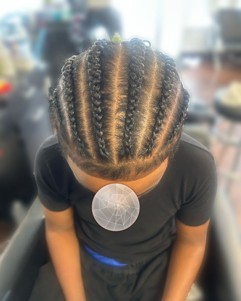 Straight-back cornrows with neat parts, seen from above