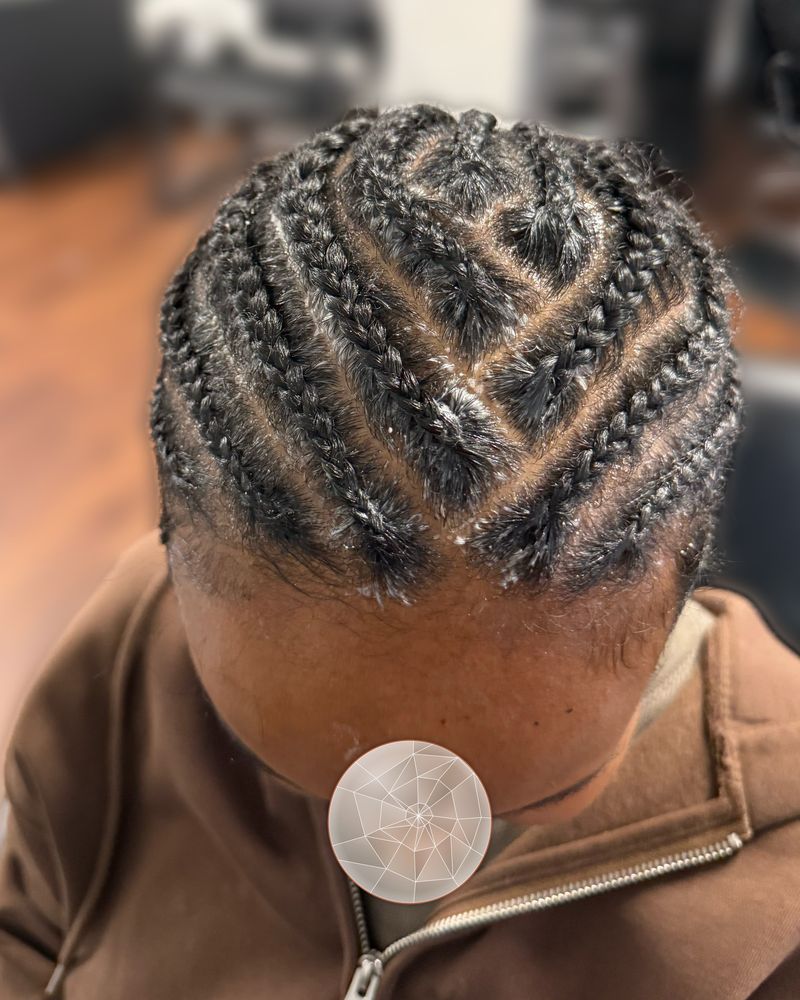 Cornrows in a V-shaped heart design, seen from above