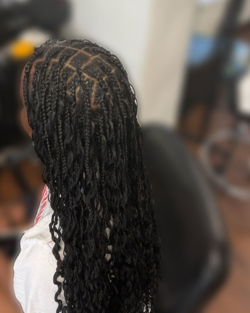 Boho knotless braids on triangle parts with curly ends